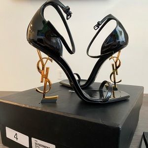 Saint Laurent Opyum Patent Leather sandals.